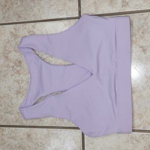 Fabletics Midi Medium Impact Sports Bra in Hazy Iris.